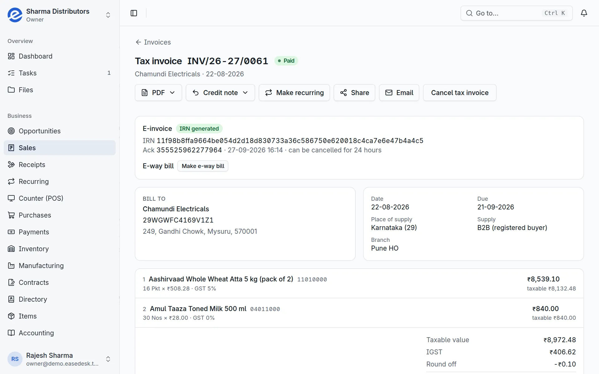 An EaseDesk tax invoice with e-Invoice status, payment recording and sharing options